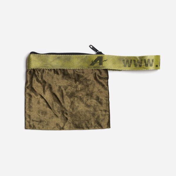 A military inspired velour fabric sling pouch.