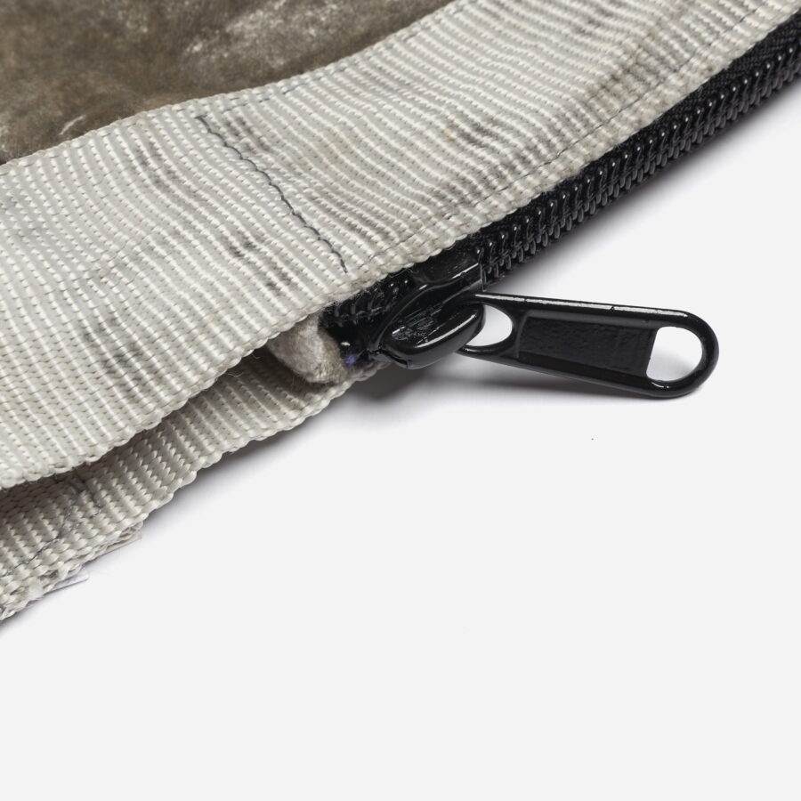 Vintage sling pouch with zip closure and recycled belt.